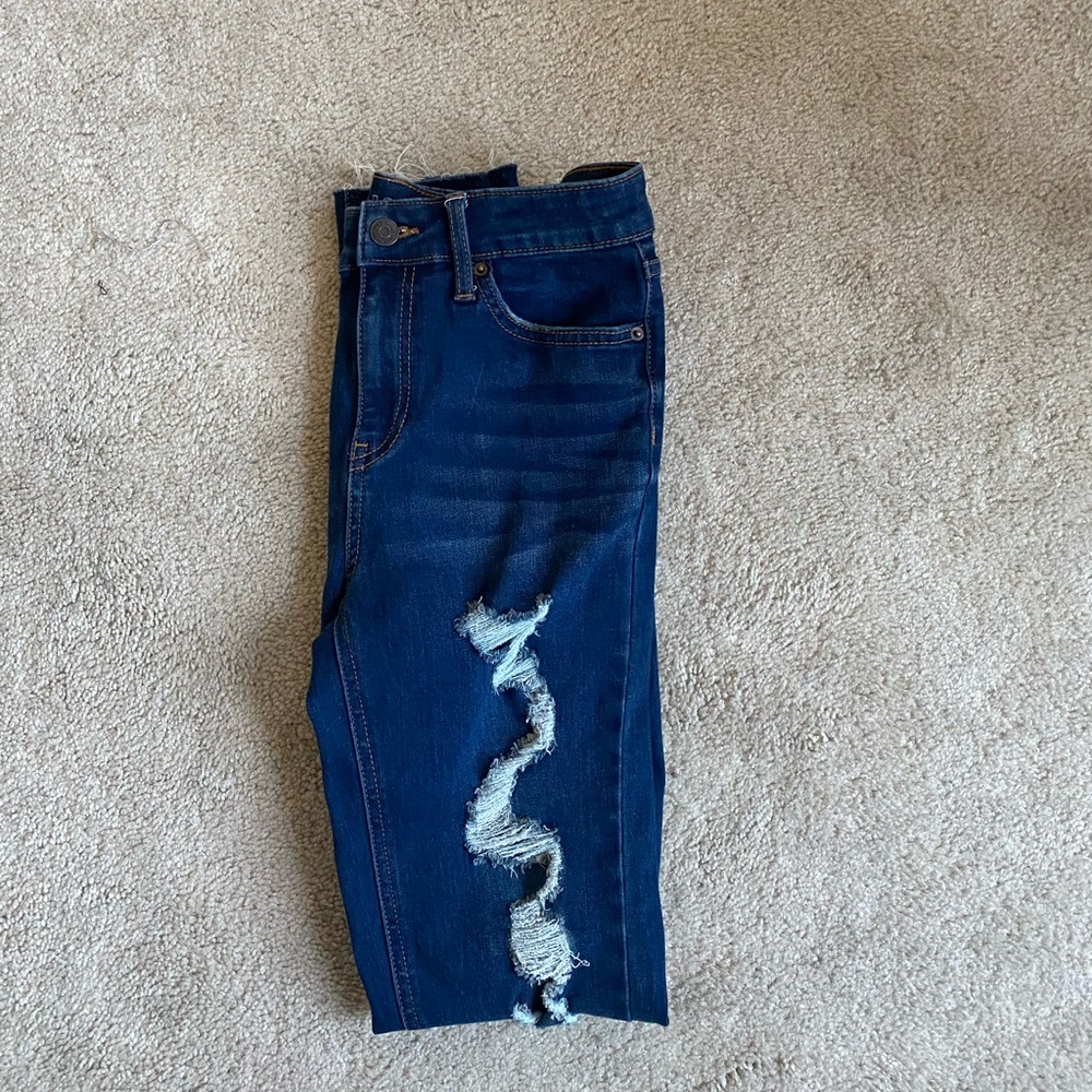 Dark blue ripped jeans